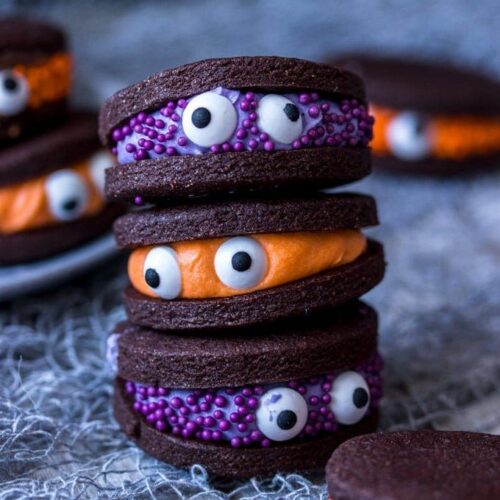 Super cute, fun and so easy to make chocolate monster sandwich cookies with coloured vanilla buttercream filling
