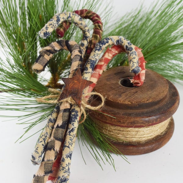 Rustic fabric wrapped candy cane Christmas ornaments