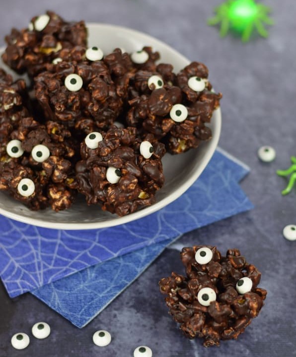 quick and easy to make Monster themed dark chocolate popcorn balls with kids for a fun Halloween treat